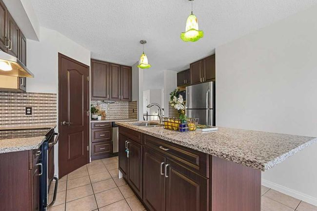 133 Tuscarora Way Nw, Home with 5 bedrooms, 2 bathrooms and 4 parking in Calgary AB | Image 12