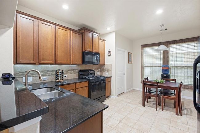 13610 Spectacled Bear Ln, House other with 5 bedrooms, 4 bathrooms and 2 parking in Crosby TX | Image 13