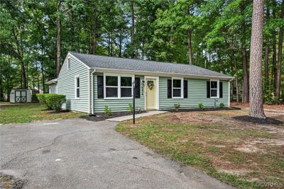 Single story home featuring a shed | Image 3