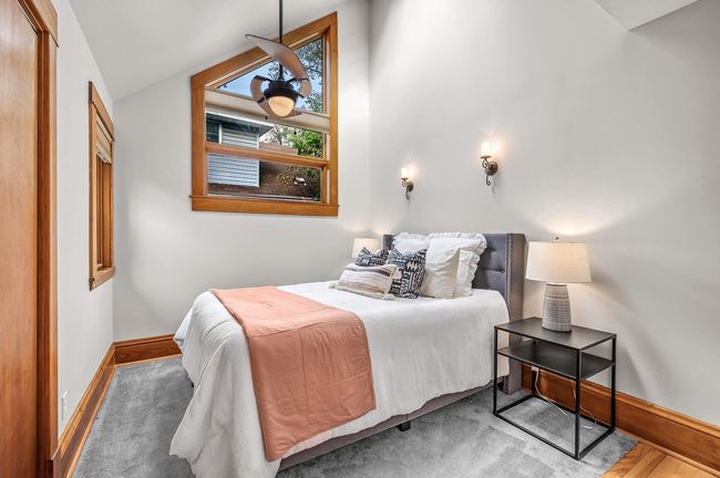 The carpet in this room is currently purple. It is being replaced with a similar color to this photo and there is a carpet sample in the closet. | Image 20