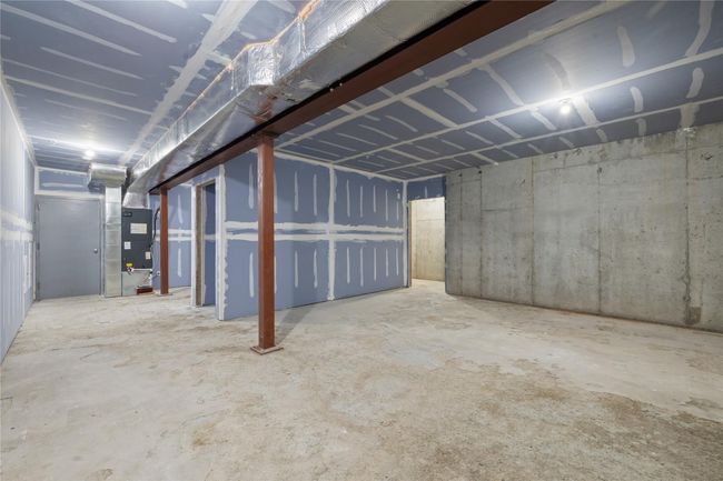 Unfinished below grade area with heating unit | Image 36
