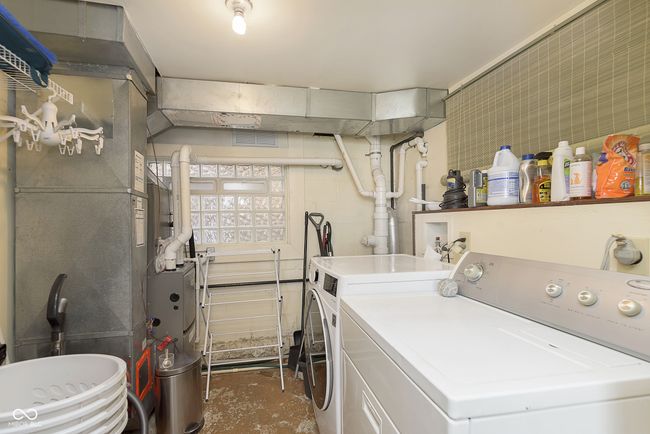 Lower level laundry room is out of the way, still is bright and light! | Image 21