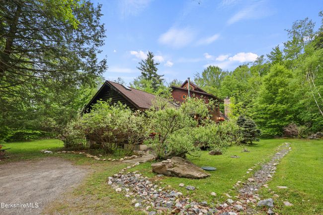 Tucked into landscaping | Image 4