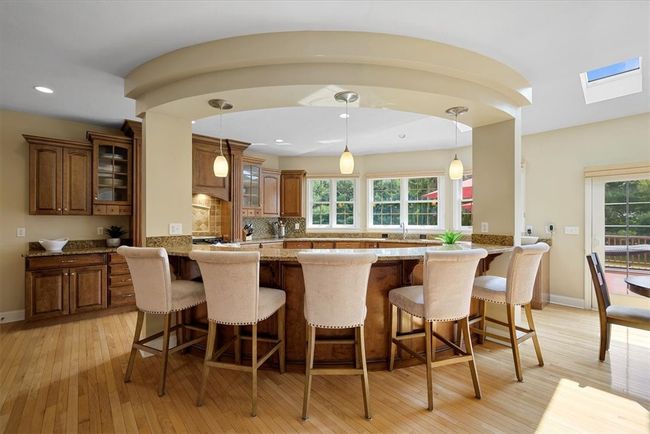 This is a great area for entertaining guests with additional seating and so much space! | Image 16