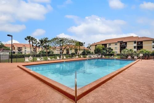 302b5-5721 Riverside Dr, Coral Springs, FL, 33067-2940 | Card Image