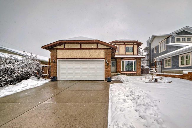 7 Hawksley Crescent Nw, Home with 4 bedrooms, 2 bathrooms and 4 parking in Calgary AB | Image 2