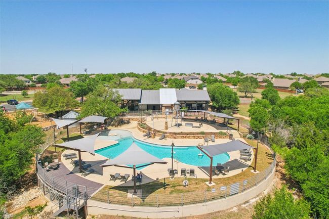 Pool featuring fence and a patio | Image 37