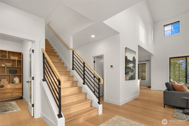 As the newest PNW master-planned community, enjoy 200+ acres of open space, trails & the Coal Trax Mt Bike Park. Soaring ceilings in the great roommake each day worthy of celebration & open floorplan appeals to entertaining. Covered deck & patio. Southern-facing homesites range from the mid600s- 900ks. Enjoy a variety of innovative & distinctive new home options with the best all-season recreation just moments away! Built for the future, indulge in a retreat just 90-min to Seattle. Plans and elevations are artist’s renderings only, may not accurately represent the actual condition of a home asconstructed and may also contain options and upgrades which are not included in the sale. Trailside Homes reserves the right to make changes to the floorplan, specifications, dimensions, design and elevations without prior notice. Stated dimensions and square footage are estimated and should not be usedas representations of the home’s actual size. | Image 20