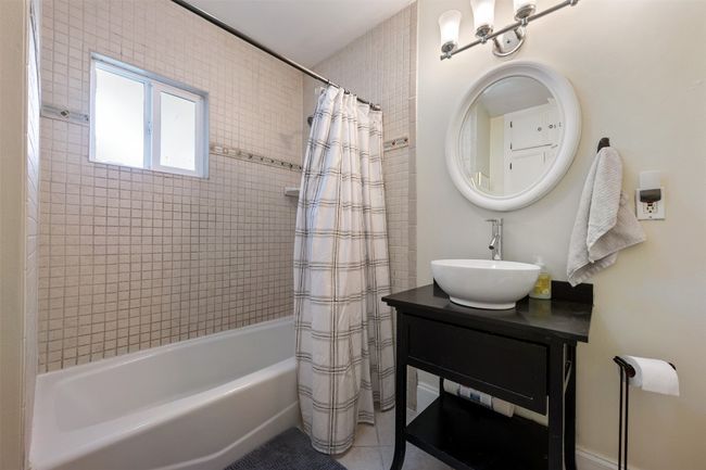 Full bathroom with tile shower. | Image 22