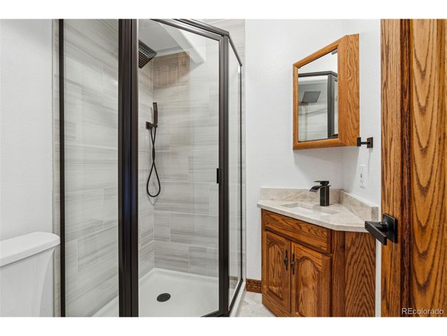 9303 Dauntless Way, House other with 4 bedrooms, 4 bathrooms and null parking in Conifer CO | Image 38