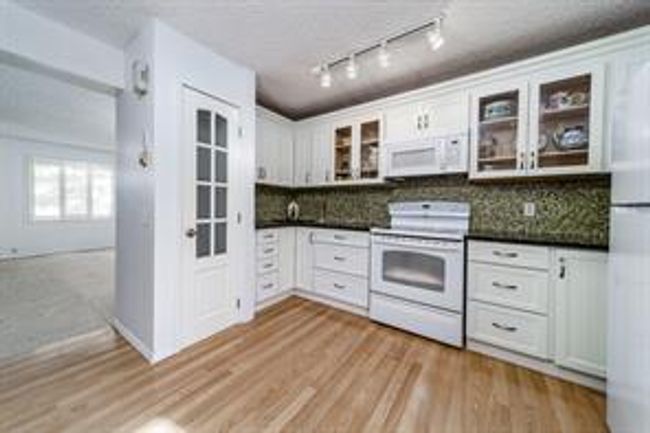 14 - 800 Bowcroft Pl, Home with 3 bedrooms, 1 bathrooms and 1 parking in Cochrane AB | Image 28
