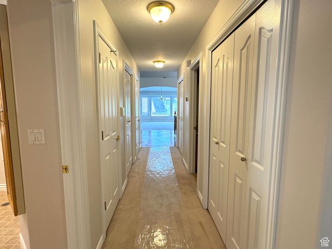 Hall with storage closets. | Image 20