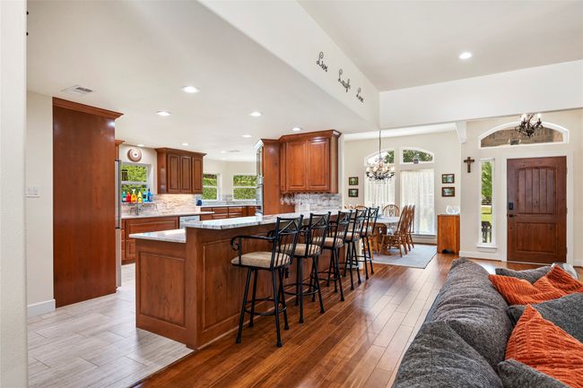 Living room open to the kitchen, dining, and entry | Image 10