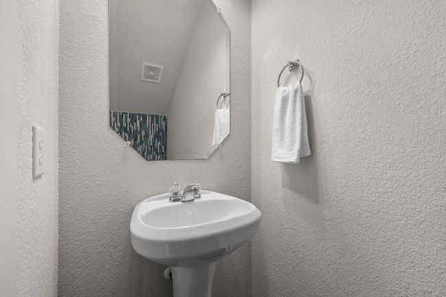 Bathroom with a textured wall | Image 26