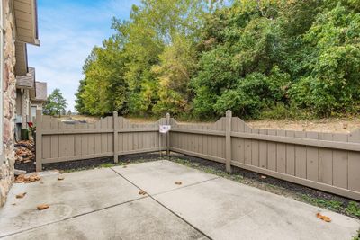 PRIVATE PATIO BACKS TO WOODS | Image 3