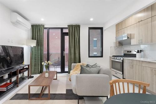 ph-b-124-28 Queens Boulevard, New York, NY, 11415 | Card Image