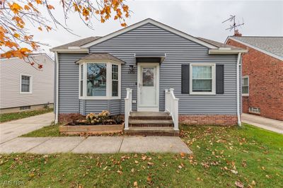 Bungalow-style home featuring a front lawn | Image 2