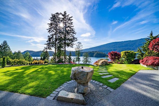 Exterior space with a yard and a water and mountain view | Image 7