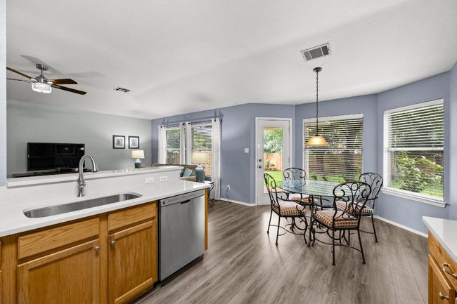 Kitchen open to dining | Image 10