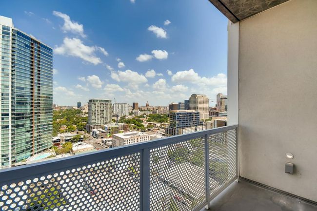 Balcony featuring a view of city | Image 17