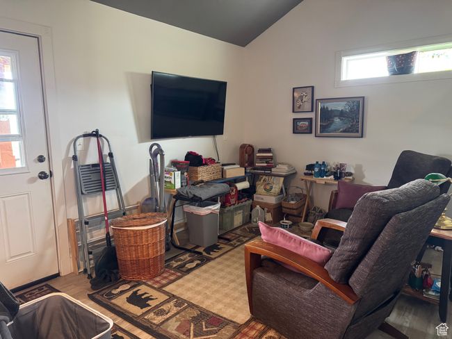 Living area featuring vaulted ceiling and wood finished floors | Image 9