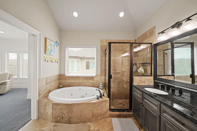Soaking tub with separate enclosed shower. | Image 17