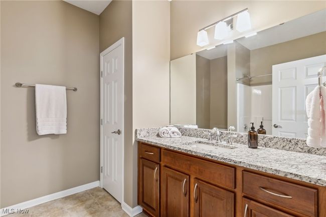 Second-floor bathroom with tub and shower combo | Image 28