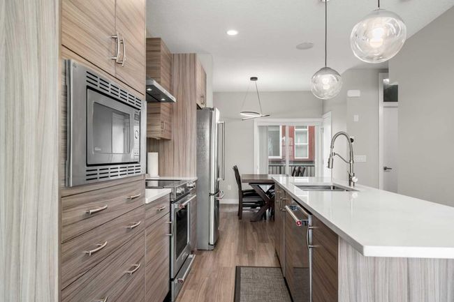 112 - 133 23 Ave Ne, Townhouse with 2 bedrooms, 4 bathrooms and 2 parking in Calgary AB | Image 4