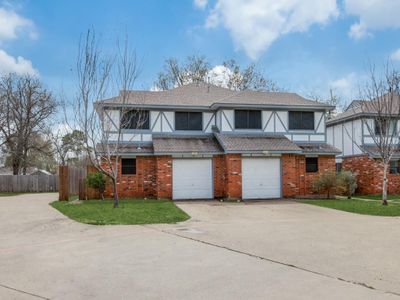 View of front of house featuring a garage | Image 2