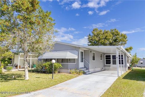 710 Amaryllis Dr, Barefoot Bay, FL, 32976-7180 | Card Image