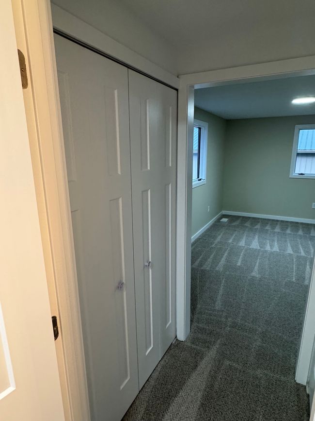 Primary Bedroom entrance to full bath | Image 17