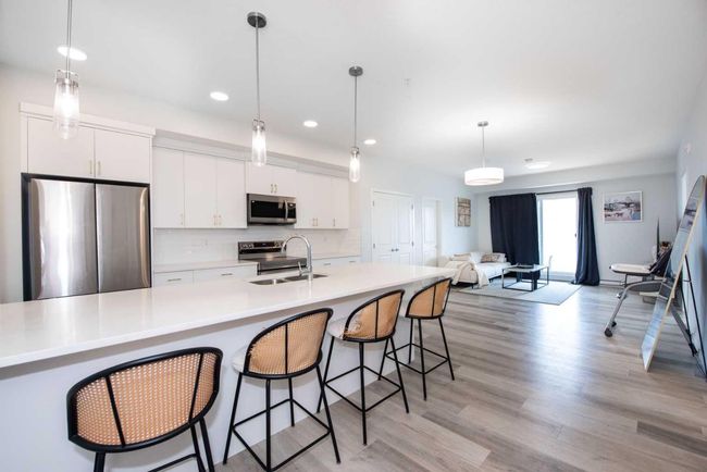 2303 - 220 Seton Grove Se, Condo with 2 bedrooms, 2 bathrooms and 1 parking in Calgary AB | Image 4