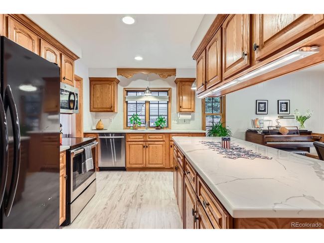 8845 W 81 St Dr, House other with 4 bedrooms, 3 bathrooms and null parking in Arvada CO | Image 11