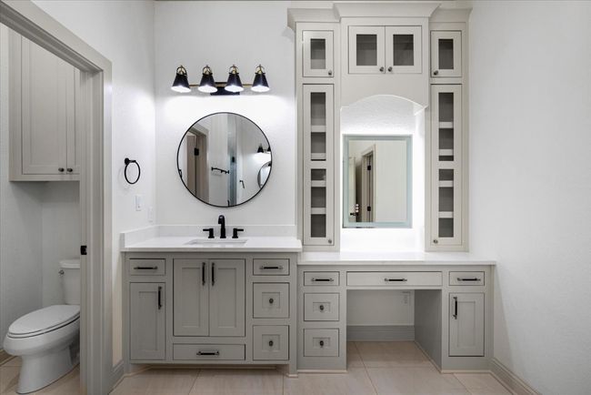 Bathroom with vanity and light tile patterned flooring | Image 21