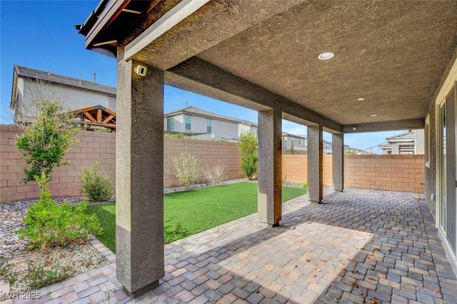 View of patio featuring a fenced backyard | Image 49