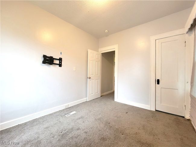 1st floor bedroom with carpet | Image 5