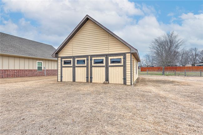 This 24x36 shop will be gaining new overheard doors, and has great loft for added storage | Image 34