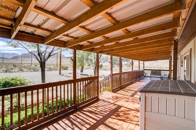 Wooden deck with a mountain view | Image 35