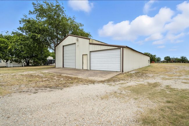 View of detached garage | Image 32