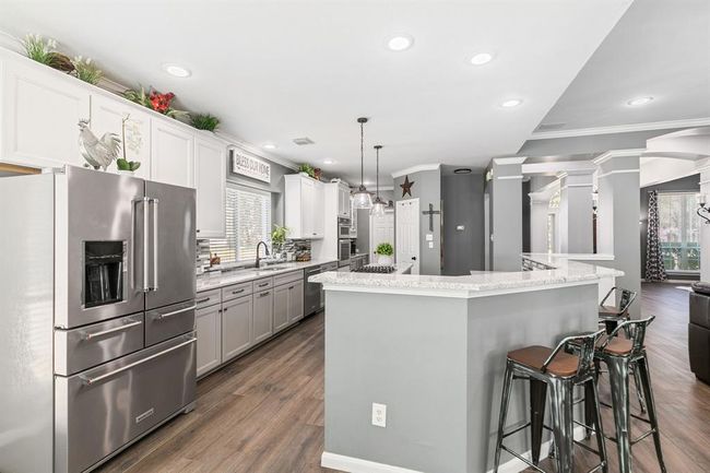 You''ll enjoy every moment spent in this well appointed kitchen. Features include, gas cooking, recessed lighting, stainless steel appliance package and spacious pantry. | Image 16