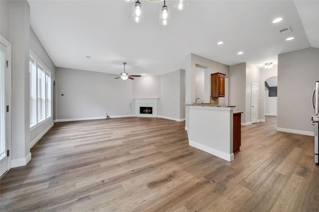 Updated baseboards and pull down cordless blinds are more of the great updates this home offers. | Image 15
