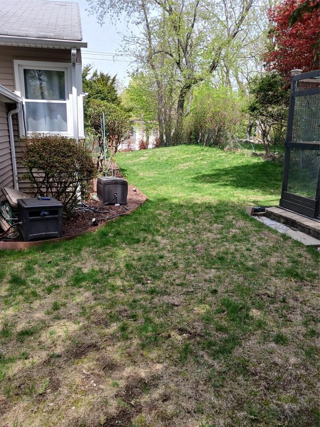 View of yard featuring cooling unit | Image 6