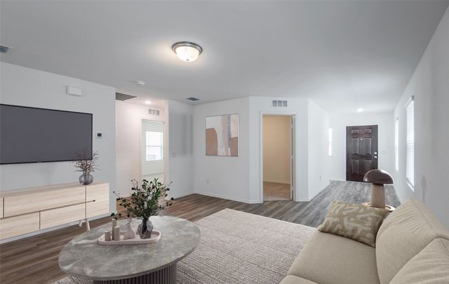 Spacious gathering room *Photos of furnished model. Not actual home. Representative of floor plan. Some options and features may vary | Image 4