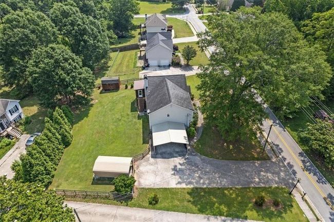 47 Powder Springs St, House other with 6 bedrooms, 3 bathrooms and 4 parking in Hiram GA | Image 49