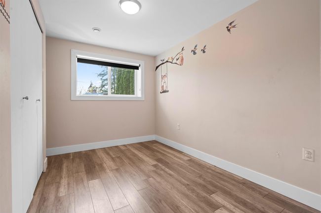 Unfurnished room with wood finished floors and baseboards | Image 17