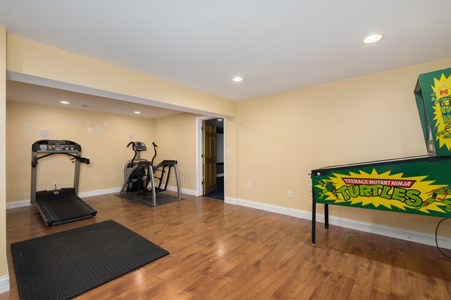 Exercise Area or Recreation Room in the finished lower level. | Image 26
