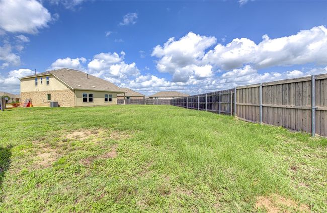 View of yard featuring central air condition unit | Image 32