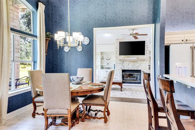 Start your mornings with coffee and golf course views in the bright, casual dining area — the perfect spot for laid-back meals and easy conversations. | Image 10