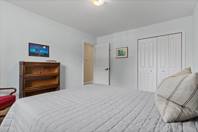 Bedroom featuring a closet | Image 22