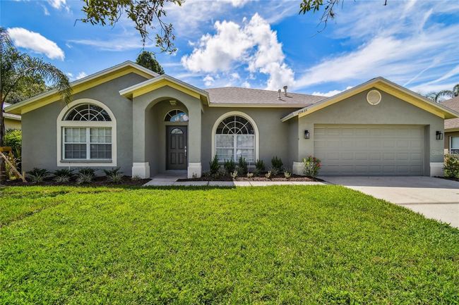 29435 Allegro Drive, House other with 4 bedrooms, 2 bathrooms and null parking in Wesley Chapel FL | Image 1